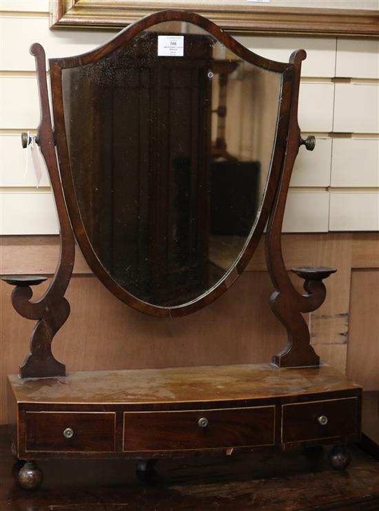 A George III and later bow fronted mahogany toilet mirror W.54cm